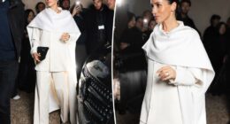 Meghan Markle bursts into laughing fit among stoic crowd at Fashion Week show