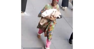 This photo taken from surveillance video footage provided by the New York Police Department, shows a woman who is wanted for questioning after an infant girl was abandoned at a New York City subway station Monday, Oct. 20, 2025 in New York. (New York Police Department via AP)