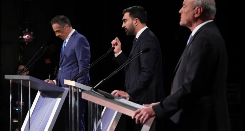 Independent candidate former New York Gov. Andrew Cuomo, Republican candidate Curtis Sliwa and Democratic candidate Assemblyman Zohran Mamdani participate in a second New York City mayoral debate at LaGuardia Performing Arts Center at LaGuardia Community College in the Queens borough of New York, Wednesday, Oct. 22, 2025. (Hiroko Masuike/The New York Times via AP, Pool)