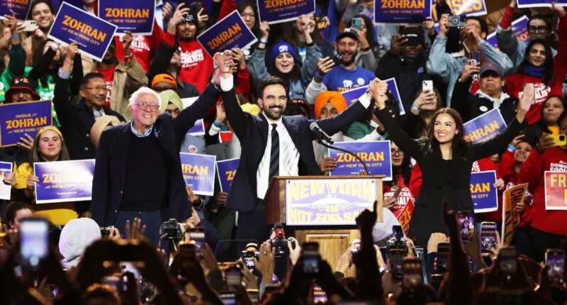 Sen. Bernie Sanders, I-Vt., left, New York City mayoral candidate Zohran Mamdani, center, and Rep. Alexandria Ocasio-Cortez, D-N.Y., appear on stage during a rally, Sunday, Oct. 26, 2025, in New York. (AP Photo/Heather Khalifa)