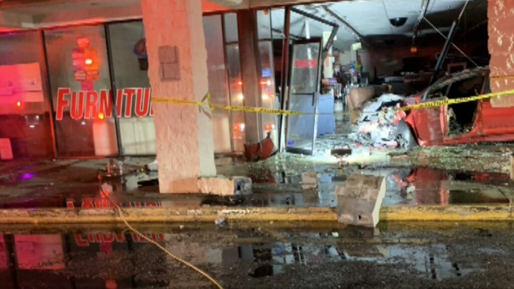 Northside store owner faces loss after car crash fire