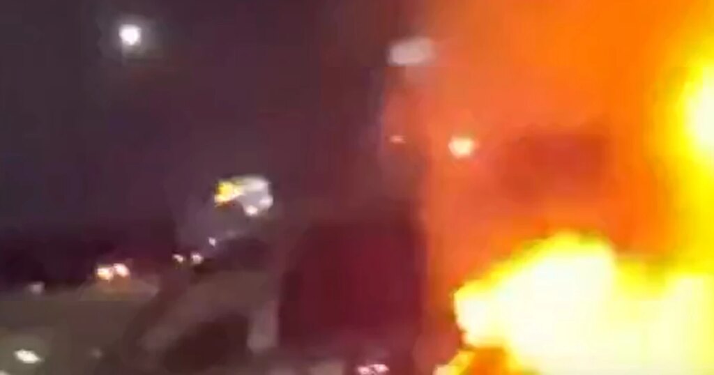 Officer pulls woman from a burning car in Texas