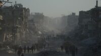 Palestinians return to ruins and US expects hostages freed on Monday as Gaza ceasefire holds