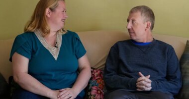 Martha Swick, left, and her husband Bill Swick look at each other at their home in Minooka, Ill., Friday, Oct. 24, 2025. (AP Photo/Nam Y. Huh)