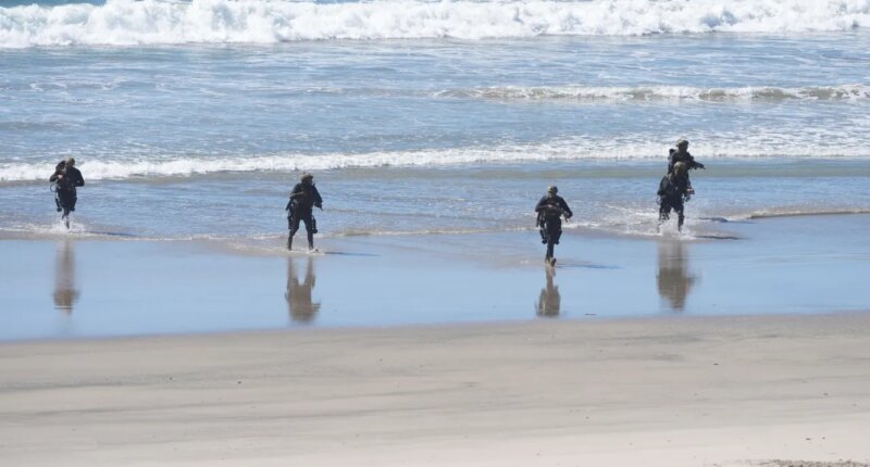 Marines perform a demonstration as Vice President JD Vance, not pictured, watches to mark the upcoming Marine Corps