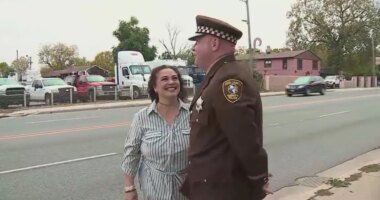 Police officer reunited with choking driver he helped save