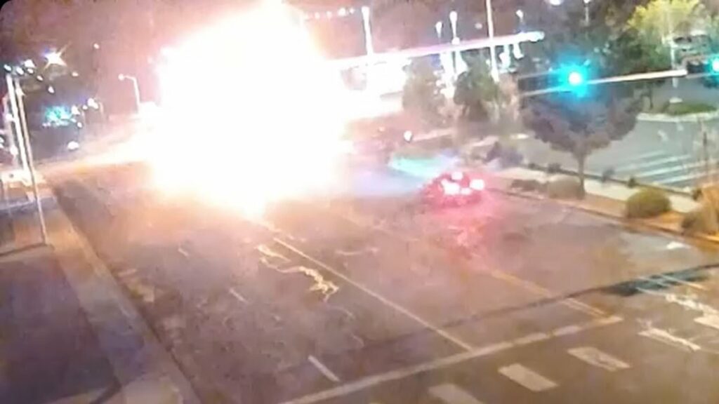 Police pull victim from burning vehicle after race leads to crash