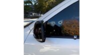 This image provided by Elizabeth Paige White shows bullet holes in a vehicle of Phillip M. Brown after a Homeland Security Investigations agent fired shots Oct. 17, 2025, in Washington, during a traffic stop. (Elizabeth Paige White via AP)