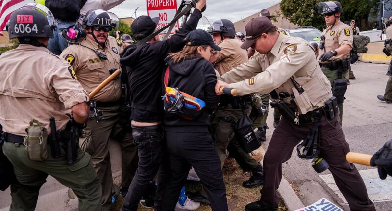 Protesters clash with police outside ICE facility in Chicago