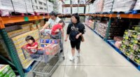 KC Neufeld, right, shops with her family in Englewood, Colo., Wednesday, Oct. 29, 2025.