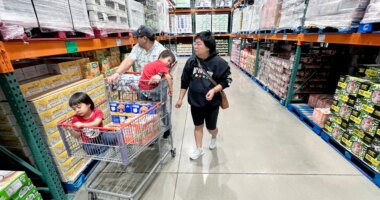 KC Neufeld, right, shops with her family in Englewood, Colo., Wednesday, Oct. 29, 2025.