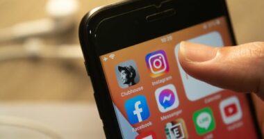 Bangkok, Thailand - February 15, 2021 : iPhone 7 showing its screen with popular social networking applications which are Clubhouse, Instagram and Facebook.