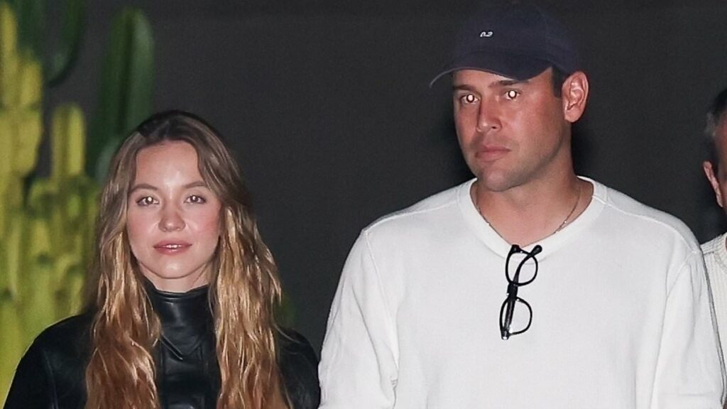Sydney Sweeney holds hands with Scooter Braun during cozy date night