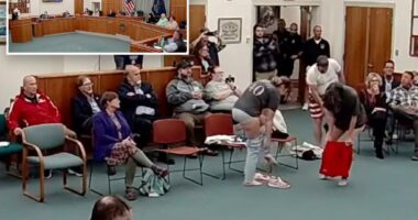 Three activists strip at a Maine school board meeting in protest of trans athlete policy