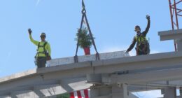 'Topping Out' ceremony celebrates final beam going into JAX's Concourse B