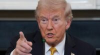 President Donald Trump answers questions from reporters during a roundtable on criminal cartels in the State Dining Room of the White House, Thursday, Oct. 23, 2025, in Washington. (AP Photo/Evan Vucci)