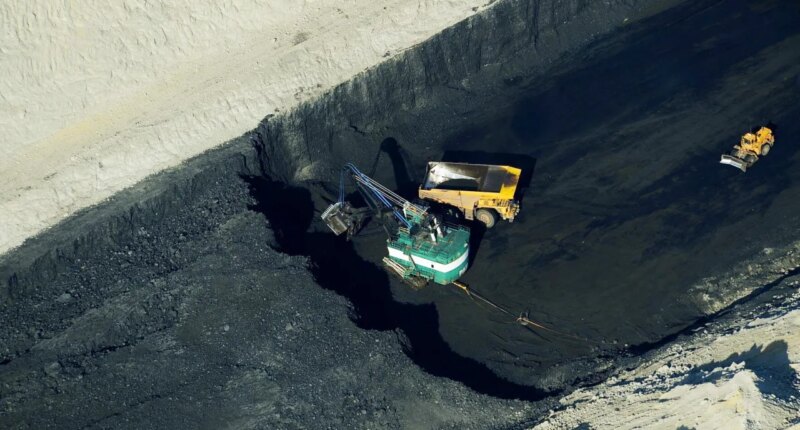The Spring Creek coal mine is seen in an aerial photograph, taken May 28, 2013, near Decker, Mont. (Larry Mayer/The Billings Gazette via AP)