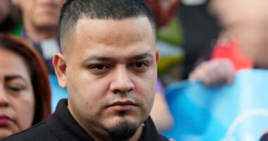 FILE - Kilmar Abrego Garcia joins supporters in a protest rally outside the Immigration and Customs Enforcement field office in Baltimore, Aug. 25, 2025. (AP Photo/Stephanie Scarbrough, File)