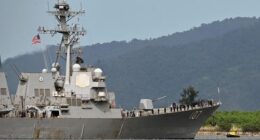 US warship arrives in Caribbean capital, upping heat on Venezuela