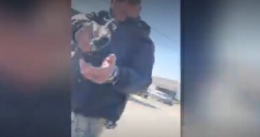 Viral video shows federal agent draw gun on pregnant woman