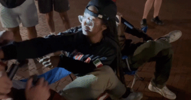 Woman caught on camera allegedly lunging at MAGA activist in viral confrontation