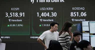 Asian shares are mostly lower following Wall Street's pause from its feverish rally