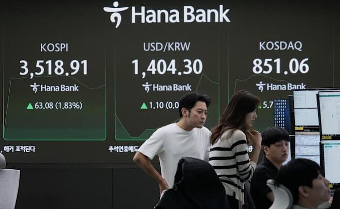 Asian shares are mostly lower following Wall Street's pause from its feverish rally