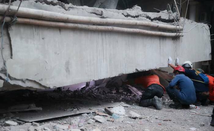 At least 91 students remain buried in rubble 2 days after school collapse in Indonesia