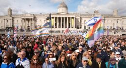 Britain is 'obviously not a safe country': Thousands of Jewish people come together to mourn two men killed in terror attack