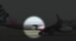 Footage shows the moment a Jetstar flight began taxiing with a cargo door wide open.