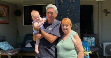 Howard and Shirley Hill with their great-granddaughter outside their beloved Dicky Beach Holiday Park home.