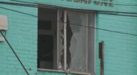 A shattered window in Sydney's inner-west after an alleged shooting