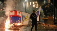 Georgia's ruling party claims landslide win in local vote boycotted by main opposition