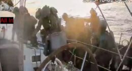 Israeli navy intercepts some flotilla boats but others are nearing the coast of Gaza, activists say