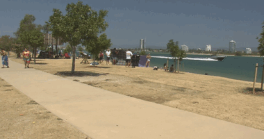 A man has died after being pulled unconscious from the water of a popular Gold Coast beach. The 54-year-old went swimming at The Spit this morning when he ran into trouble. Families nearby used picnic rugs to shelter the man as lifeguards and paramedics performed CPR.
