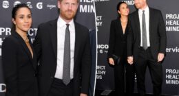 Meghan Markle stuns in black suit for rare red carpet appearance with Prince Harry