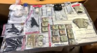 Police: Nearly 3 pounds of meth, firearms seized from Scott Co. home