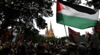 SYDNEY, AUSTRALIA - AUGUST 24: Protesters gather at the National March for a pro-Palestine rally on August 24, 2025 in Sydney, Australia. Protests were held around the country as the international community continues to seek a sustainable solution for the ongoing conflict between Israel and Hamas in Gaza. (Photo by Izhar Khan/Getty Images)