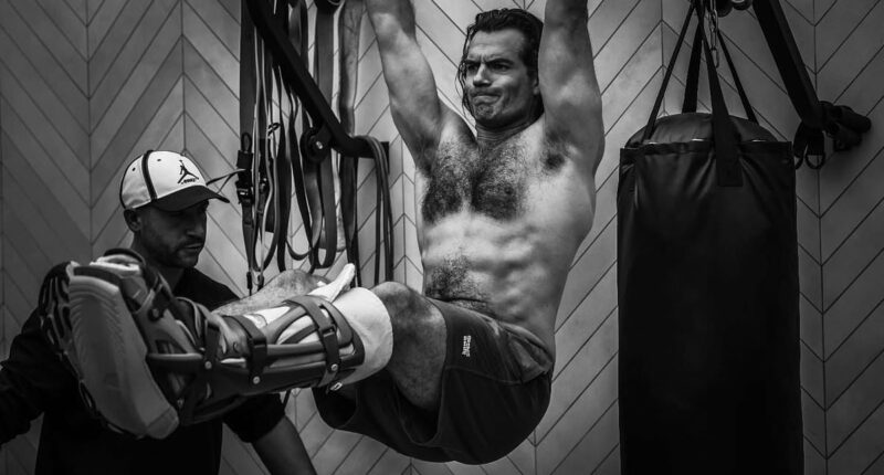 Shirtless Henry Cavill shows off his physique as he begins rehab