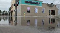‘Will be lapping on our door:’ Shop owners battle flooding on North Beach Street