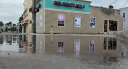 ‘Will be lapping on our door:’ Shop owners battle flooding on North Beach Street