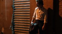This image released by 20th Century Studios shows Jeremy Allen White as Bruce Springsteen in a scene from