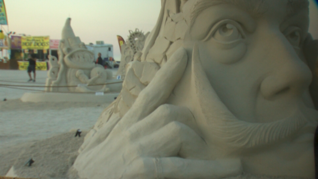 ‘Sanding Ovations’ gravity-defying sculptures return to Treasure Island Beach