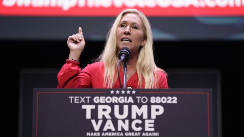 Rep. Marjorie Taylor Greene, R-Ga., speaks before Republican presidential candidate former President Donald Trump arrives to deliver remarks on the tax code, and manufacturing at the Johnny Mercer Theatre Civic Center, Tuesday, Sept. 24, 2024, in Savannah, Ga.