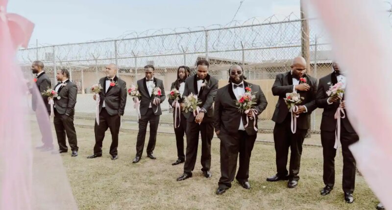 This photo provided by God Behind Bars shows prisoners at the Louisiana State Penitentiary before a father-daughter dance held inside the lockup in Angola, La., on Saturday, Nov. 22, 2025. (God Behind Bars via AP)
