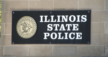 Adopted mother of slain Vandalia 14-year-old arrested on gun charges