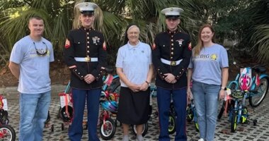 Associa donates 125 bikes to local children during annual giveaway