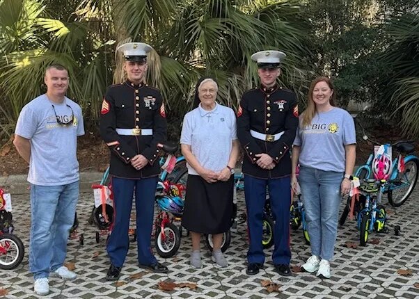 Associa donates 125 bikes to local children during annual giveaway