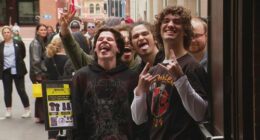 Heavy metal legends Metallica have touched down in Adelaide, with tens of thousands of fans hot on their heels, lining up in long queues to snag some unique mementos.