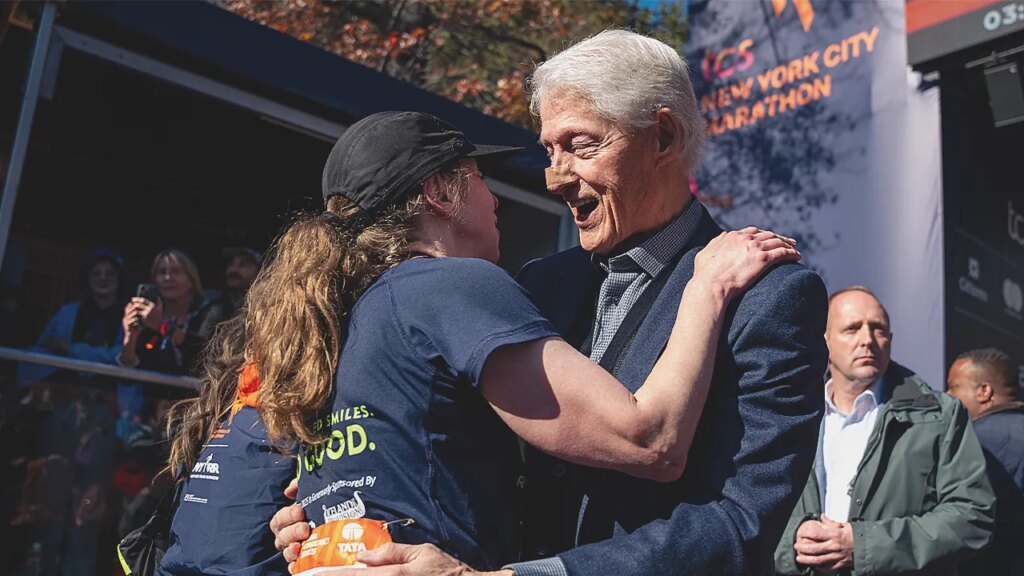 Bill Clinton spotted at NYC Marathon with bandaged nose while cheering on daughter Chelsea